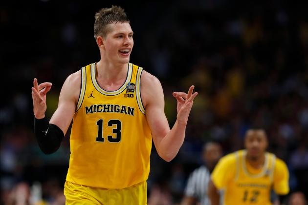 Michigan's Moritz Wagner (13) reacts after scoring a 3-point shot against Loyola-Chicago during the second half in the semifinals of the Final Four NCAA college basketball tournament, Saturday, March 31, 2018, in San Antonio. (AP Photo/Charlie Neibergall)