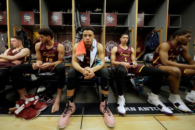 Loyola-Chicago's Marques Townes (5) and the rest of the team react in the locker room after the semifinal game against Michigan in the Final Four NCAA college basketball tournament, Saturday, March 31, 2018, in San Antonio. Michigan won 69-57. (AP Photo/Eric Gay)