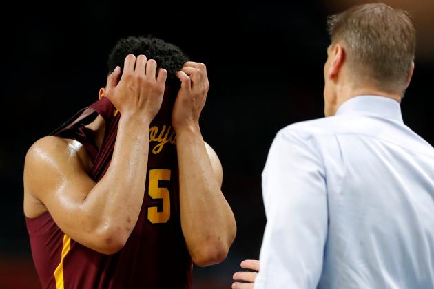 Loyola-Chicago guard Marques Townes, left, reacts in front of head coach Porter Moser during the second half against Michigan in the semifinals of the Final Four NCAA college basketball tournament, Saturday, March 31, 2018, in San Antonio. (AP Photo/Charlie Neibergall)
