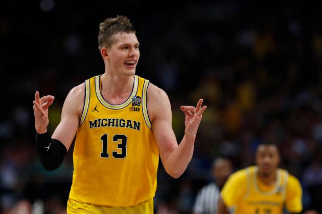 Michigan's Moritz Wagner (13) reacts after scoring a 3-point shot against Loyola-Chicago during the second half in the semifinals of the Final Four NCAA college basketball tournament, Saturday, March 31, 2018, in San Antonio. (AP Photo/Charlie Neibergall)