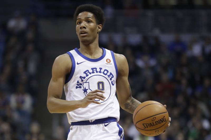 Golden State Warriors' Patrick McCaw dribbles during the first half of an NBA basketball game against the Milwaukee Bucks Friday, Jan. 12, 2018, in Milwaukee. (AP Photo/Morry Gash)