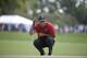 Tiger Woods lines up a putt on the second green during the final round of the Arnold Palmer Invitational golf tournament Sunday, March 18, 2018, in Orlando, Fla. (AP Photo/Phelan M. Ebenhack)