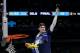 Villanova's Donte DiVincenzo cuts the net as he celebrates after the championship game of the Final Four NCAA college basketball tournament against Michigan, Monday, April 2, 2018, in San Antonio. Villanova won 79-62. (AP Photo/David J. Phillip)