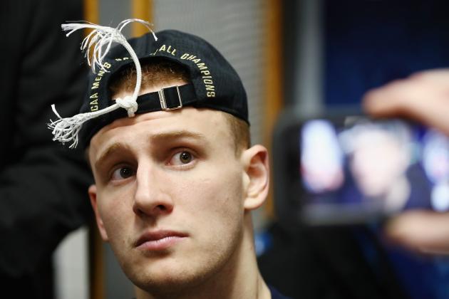 SAN ANTONIO, TX - APRIL 02: Donte DiVincenzo #10 of the Villanova Wildcats speaks to the media in the locker room after defeating the Michigan Wolverines during the 2018 NCAA Men's Final Four National Championship game at the Alamodome on April 2, 2018 in San Antonio, Texas. Villanova defeated Michigan 79-62.  (Photo by Ronald Martinez/Getty Images)