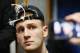 SAN ANTONIO, TX - APRIL 02: Donte DiVincenzo #10 of the Villanova Wildcats speaks to the media in the locker room after defeating the Michigan Wolverines during the 2018 NCAA Men's Final Four National Championship game at the Alamodome on April 2, 2018 in San Antonio, Texas. Villanova defeated Michigan 79-62. (Photo by Ronald Martinez/Getty Images)