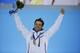 Men’s biathlon 10k sprint gold medalist Norway's Ole Einar Bjoerndalen celebrates on the podium during the medals ceremony at the 2014 Winter Olympics, Sunday, Feb. 9, 2014, in Sochi, Russia. (AP Photo/David Goldman)
