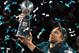MINNEAPOLIS, MN - FEBRUARY 04: Nick Foles #9 of the Philadelphia Eagles celebrates with the Lombardi Trophy after defeating the New England Patriots 41-33 in Super Bowl LII at U.S. Bank Stadium on February 4, 2018 in Minneapolis, Minnesota. (Photo by Mike Ehrmann/Getty Images)