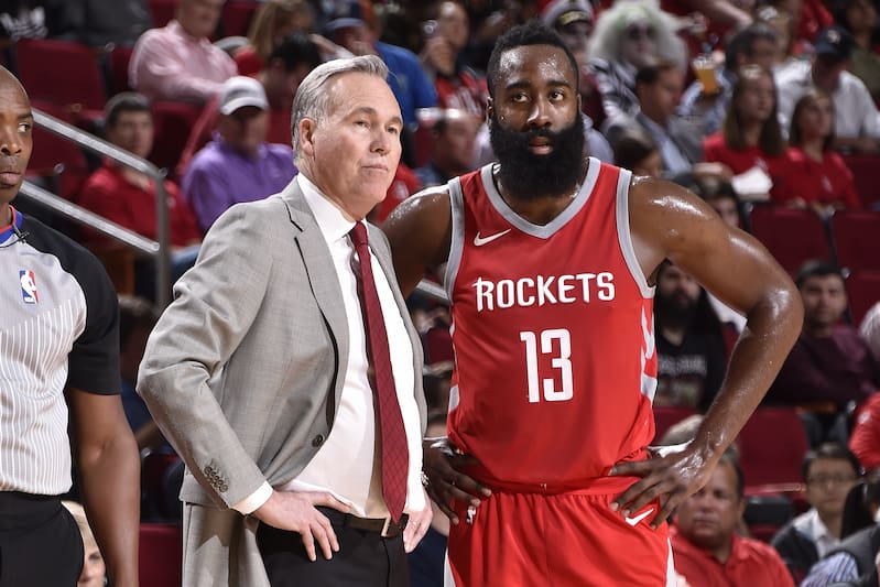 HOUSTON, TX - OCTOBER 30: James Harden #13 and Head Coach Mike D'Antoni of the Houston Rockets looks on during the game against the Philadelphia 76ers on October 30, 2017 at the Toyota Center in Houston, Texas. NOTE TO USER: User expressly acknowledges and agrees that, by downloading and or using this photograph, User is consenting to the terms and conditions of the Getty Images License Agreement. Mandatory Copyright Notice: Copyright 2017 NBAE (Photo by Bill Baptist/NBAE via Getty Images)