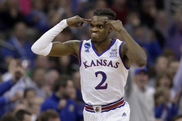 Kansas' Lagerald Vick celebrates after making a 3-point basket during the second half of a regional final game against Duke in the NCAA men's college basketball tournament Sunday, March 25, 2018, in Omaha, Neb. (AP Photo/Nati Harnik)