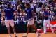 France's Nicolas Mahut (L), compatriot France's Pierre-Hugues Herbert and coach Yannick Noah celebrate a point against Italy's Fabio Fognini and Italy's Simone Bolelli during the Davis Cup quarter-final doubles tennis match Italy vs France at the Valletta Cambiaso Camp in Genova, on April 7, 2018. / AFP PHOTO / Vincenzo PINTO (Photo credit should read VINCENZO PINTO/AFP/Getty Images)