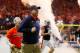 ATLANTA, GA - DECEMBER 02: Head coach Gus Malzahn of the Auburn Tigers runs out of the tunnel with his team prior to the game against the Auburn Tigers in the SEC Championship at Mercedes-Benz Stadium on December 2, 2017 in Atlanta, Georgia. (Photo by Kevin C. Cox/Getty Images)