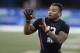 LSU running back Derrius Guice runs a drill during the NFL football scouting combine, Friday, March 2, 2018, in Indianapolis. (AP Photo/Darron Cummings)