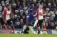 Chelsea's Willian, centre, competes for the ball with Southampton's James Ward-Prowse, right, as Southampton's Ryan Bertrand, left, chases during the English Premier League soccer match between Chelsea and Southampton at Stamford Bridge in London, Saturday Dec. 16, 2017. (AP Photo/Tim Ireland)