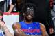 PHILADELPHIA, PA - APRIL 11: Joel Embiid #21 of the Philadelphia 76ers looks on prior to the game against the Milwaukee Bucks on April 11, 2018 in Philadelphia, Pennsylvania NOTE TO USER: User expressly acknowledges and agrees that, by downloading and/or using this Photograph, user is consenting to the terms and conditions of the Getty Images License Agreement. Mandatory Copyright Notice: Copyright 2018 NBAE (Photo by Jesse D. Garrabrant/NBAE via Getty Images)