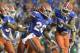 Florida defensive back Marcell Harris (26) is congratulated by defensive back Quincy Wilson (6) and defensive back Teez Tabor (31) after Harris intercepted a pass during the first half of an NCAA college football game against North Texas in Gainesville, Fla., Saturday, Sept. 17, 2016. (AP Photo/Phelan M. Ebenhack)