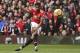 TOPSHOT - Manchester United's English striker Marcus Rashford scores the opening goal during the English Premier League football match between Manchester United and Liverpool at Old Trafford in Manchester, north west England, on March 10, 2018. / AFP PHOTO / Oli SCARFF / RESTRICTED TO EDITORIAL USE. No use with unauthorized audio, video, data, fixture lists, club/league logos or 'live' services. Online in-match use limited to 75 images, no video emulation. No use in betting, games or single club/league/player publications. / (Photo credit should read OLI SCARFF/AFP/Getty Images)