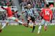 NEWCASTLE UPON TYNE, ENGLAND - FEBRUARY 11: Alexis of Manchester United challenges Jonjo Shelvey of Newcastle United for the ball during the Premier League match between Newcastle United and Manchester United at St. James Park on February 10, 2018 in Newcastle upon Tyne, England. (Photo by Mark Runnacles/Getty Images)