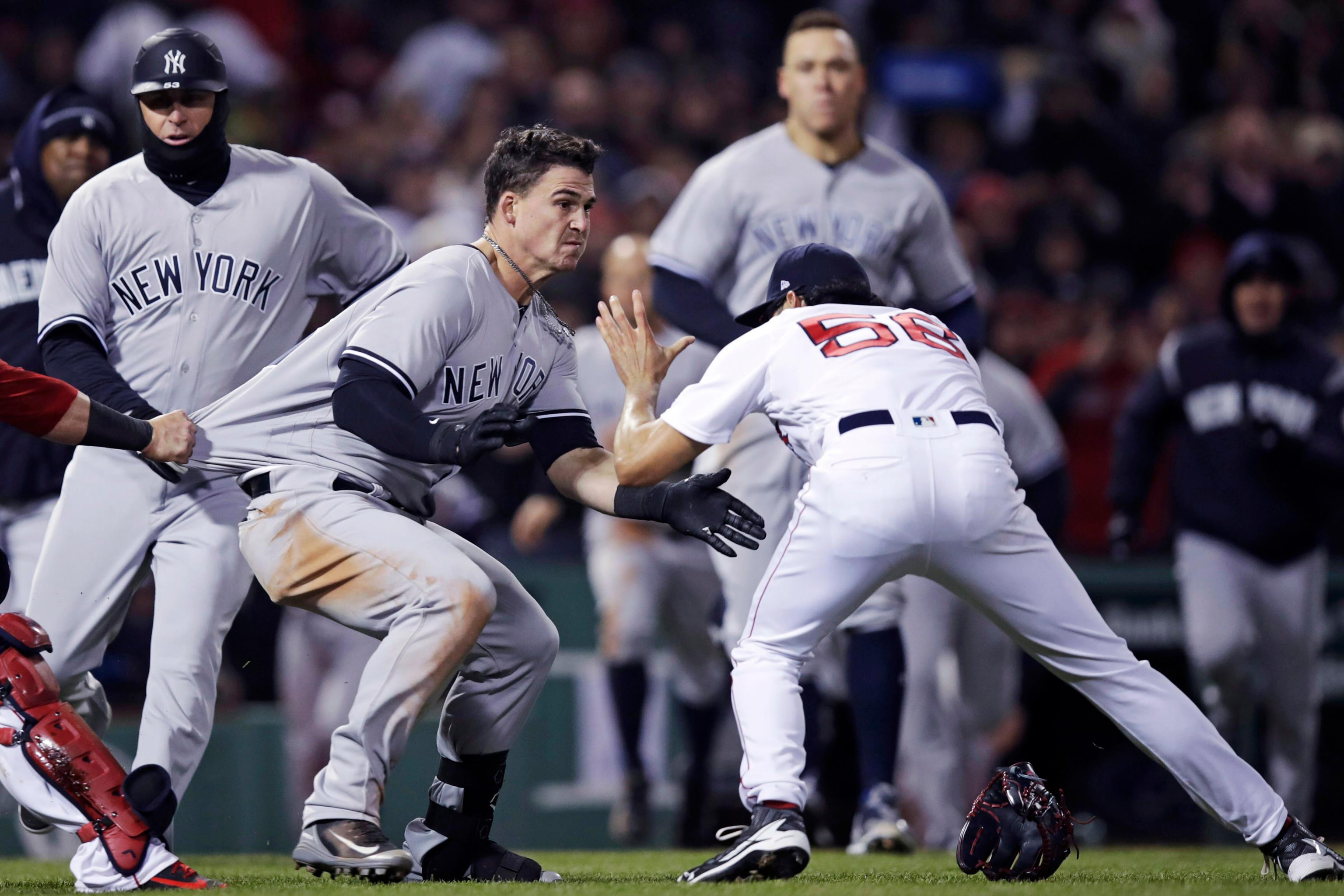 Yankees CC Sabathia throws a strike to Boston Red Sox short stop Xander  Bogaerts