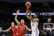 Kentucky guard Shai Gilgeous-Alexander (22) shoots as Davidson guard Kellan Grady (31) defends during the second half of a first-round game in the NCAA men's college basketball tournament Thursday, March 15, 2018, in Boise, Idaho. (AP Photo/Otto Kitsinger)