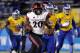 FILE - In this Saturday, Nov. 4, 2017 file photo, San Diego State running back Rashaad Penny runs against San Jose State during an NCAA college football game in San Jose, Calif. Two of college football’s most dominant rushing attacks will clash when San Diego State faces Army in the Armed Forces Bowl on Saturday, Dec. 23, 2017, even though the two offenses are dramatically different.(AP Photo/Marcio Jose Sanchez, File)