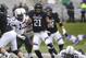 Northwestern running back Justin Jackson (21) runs with the ball against Minnesota during the first half of an NCAA college football game in Evanston, Ill., Saturday, Nov. 18, 2017. (AP Photo/Nam Y. Huh)