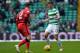 GLASGOW, SCOTLAND - MARCH 03: Kieran Tierney of Celtic is challenged by Michael Tidser of Greenock Morton during the Scottish Cup Quarter Final match between Celtic and Greenock Morton at Celtic Park on March 3, 2018 in Glasgow, Scotland. (Photo by Mark Runnacles/Getty Images)