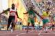 GOLD COAST, AUSTRALIA - APRIL 14: Harry Aikines-Aryeetey of England crosses the line to win gold ahead of Akani Simbine of South Africa and Josh Clarke of Australia in the Men's 4x100 metres relay final during athletics on day 10 of the Gold Coast 2018 Commonwealth Games at Carrara Stadium on April 14, 2018 on the Gold Coast, Australia. (Photo by Mark Metcalfe/Getty Images)