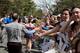 WELLESLEY, MA - APRIL 17: Crowds cheer on Boston Marathon runners in the iconic 'scream tunnel' near Wellesley College on April 17, 2017, in Wellesley Massachusetts. (Photo by Kayana Szymczak/Getty Images)