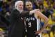 OAKLAND, CA - APRIL 14: Head coach Gregg Popovich of the San Antonio Spurs talks with his player Tony Parker #9 against the Golden State Warriors in the second quarter during Game One of the first round of the 2018 NBA Playoff at ORACLE Arena on April 14, 2018 in Oakland, California. NOTE TO USER: User expressly acknowledges and agrees that, by downloading and or using this photograph, User is consenting to the terms and conditions of the Getty Images License Agreement. (Photo by Thearon W. Henderson/Getty Images)