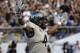 Central Florida wide receiver Tre'Quan Smith (4) celebrates with fans after scoring a touchdown against Memphis during the second half of the American Athletic Conference championship NCAA college football game, Saturday, Dec. 2, 2017, in Orlando, Fla. Central Florida won in overtime 62-55. (AP Photo/John Raoux)