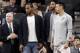 FILE - In this Jan. 21, 2018, file photo, San Antonio Spurs guard Danny Green, right, stands at the bench with injured teammates Kawhi Leonard, second from left, and Rudy Gay, center, during the second half of an NBA basketball game against the Indiana Pacers in San Antonio. Leonard plans on returning this season and wants to remain with the Spurs for life, refuting reports of dissension with the star forward and the only franchise he has played for. Leonard has missed all but nine games this season with right quadriceps tendinopathy, which initially flared up late in the offseason. (AP Photo/Eric Gay, File)