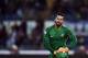 Roma's goalkeeper from Brazil Alisson Ramses Becker looks on during the Italian Serie A football match Lazio vs Roma at the Olympic Stadium in Rome on April 15, 2018. / AFP PHOTO / FILIPPO MONTEFORTE (Photo credit should read FILIPPO MONTEFORTE/AFP/Getty Images)