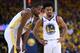 OAKLAND, CA - APRIL 14: Quinn Cook #4 and Kevin Durant #35 of the Golden State Warriors talk with each other while there's a break in the action of the third quarter during Game One of the first round of the 2018 NBA Playoff against the San Antonio Spurs at ORACLE Arena on April 14, 2018 in Oakland, California. NOTE TO USER: User expressly acknowledges and agrees that, by downloading and or using this photograph, User is consenting to the terms and conditions of the Getty Images License Agreement. (Photo by Thearon W. Henderson/Getty Images)