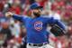 Chicago Cubs starting pitcher Tyler Chatwood throws in the second inning of a baseball game against the Cincinnati Reds, Monday, April 2, 2018, in Cincinnati. (AP Photo/John Minchillo)