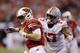 Wisconsin quarterback Alex Hornibrook (12) is tackled by Ohio State's Jerome Baker (17) during the second half of the Big Ten championship NCAA college football game, Saturday, Dec. 2, 2017, in Indianapolis. (AP Photo/Michael Conroy)