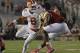 Clemson linebacker Dorian O'Daniel (6) brings down Boston College quarterback Darius Wade (4) during the second half of an NCAA football game at Alumni Stadium, Friday, Oct. 7, 2016, in Boston. (AP Photo/Elise Amendola)