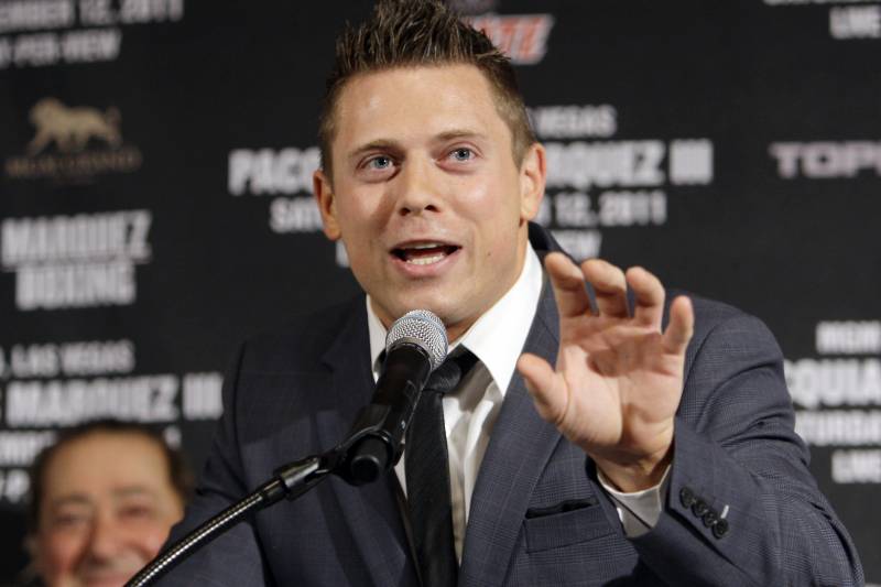 WWE Champion The Miz, center, speaks at a news conference to promote a world welterweight champioship bout between Manny Pacquiao, of the Philippines, and Juan Manuel Marquez, of Mexico, Pacquiao-Marquez III, in Beverly Hills, Calif., Wednesday, Sept. 7, 2011. The fighters will meet Saturday, Nov. 12, 2011, at the MGM Grand in Las Vegas. (AP Photo/Reed Saxon)