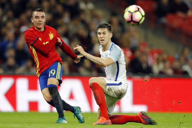Spain's Iago Aspas, left, scores his side's first goal during the international friendly soccer match between England and Spain at Wembley stadium in London, Tuesday, Nov. 15, 2016. (AP Photo/Frank Augstein)