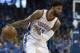 OKLAHOMA CITY, OK - APRIL 15: Paul George #13 of the Oklahoma City Thunder works the ball against the Utah Jazz during the second half of Game One of the Western Conference in the 2018 NBA Playoffs at the Chesapeake Energy Arena on April 15, 2018 in Oklahoma City, Oklahoma. NOTE TO USER: User expressly acknowledges and agrees that, by downloading and or using this photograph, User is consenting to the terms and conditions of the Getty Images License Agreement. (Photo by J Pat Carter/Getty Images) *** Local Caption *** Paul George;