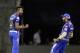 Mumbai Indians player Hardik Pandya, left and Rohit Sharma celebrates after Suresh Raina's wicket against Chennai Super Kings during VIVO IPL cricket T20 match in Mumbai, India, Saturday, April 7, 2018. (AP Photo/Rajanish Kakade)