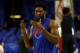 Philadelphia 76ers' Joel Embiid, of Cameroon, about to put his mask back on prior to the first half in Game 1 of a first-round NBA basketball playoff series against the Miami Heat, Saturday, April 14, 2018, in Philadelphia. (AP Photo/Chris Szagola)