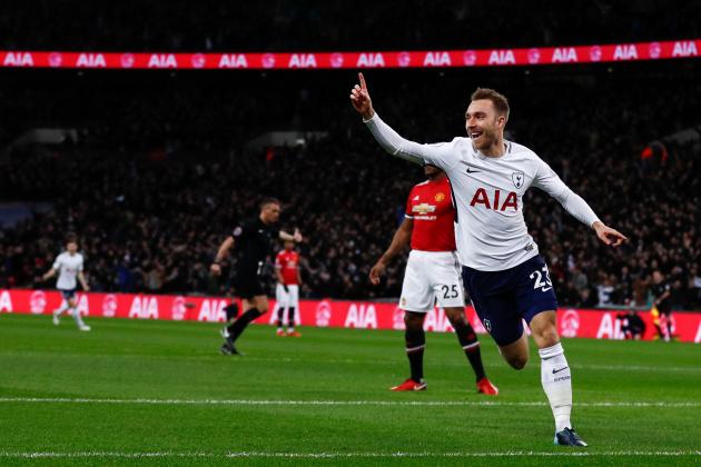 Tottenham Hotspur's Danish midfielder Christian Eriksen celebrates scoring the opening goal during the English Premier League football match between Tottenham Hotspur and Manchester United at Wembley Stadium in London, on January 31, 2018. / AFP PHOTO / Adrian DENNIS / RESTRICTED TO EDITORIAL USE. No use with unauthorized audio, video, data, fixture lists, club/league logos or 'live' services. Online in-match use limited to 75 images, no video emulation. No use in betting, games or single club/league/player publications.  /         (Photo credit should read ADRIAN DENNIS/AFP/Getty Images)