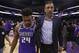 Sacramento Kings guard Buddy Hield, left, and Vlade Divac, the Kings vice president of basketball operations and general manager walk off the court together after the Kings defeated the Houston Rockets 96-83 in an NBA basketball game, Wednesday, April 11, 2018, in Sacramento, Calif. (AP Photo/Rich Pedroncelli)