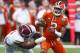 Clemson quarterback Kelly Bryant (2) is sacked by Alabama defensive lineman Da'Shawn Hand (9) in the second half of the Sugar Bowl semi-final playoff game for the NCAA college football national championship, in New Orleans, Monday, Jan. 1, 2018. (AP Photo/Butch Dill)