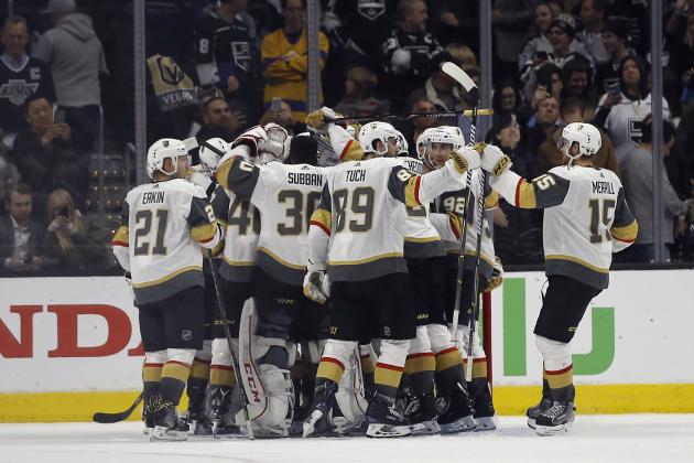 Vegas Golden Knights players celebrate after defeating the Los Angeles Kings 1-0, and sweeping the series in Game 4 of an NHL hockey first-round playoff series in Los Angeles, Tuesday, April 17, 2018. (AP Photo/Alex Gallardo)