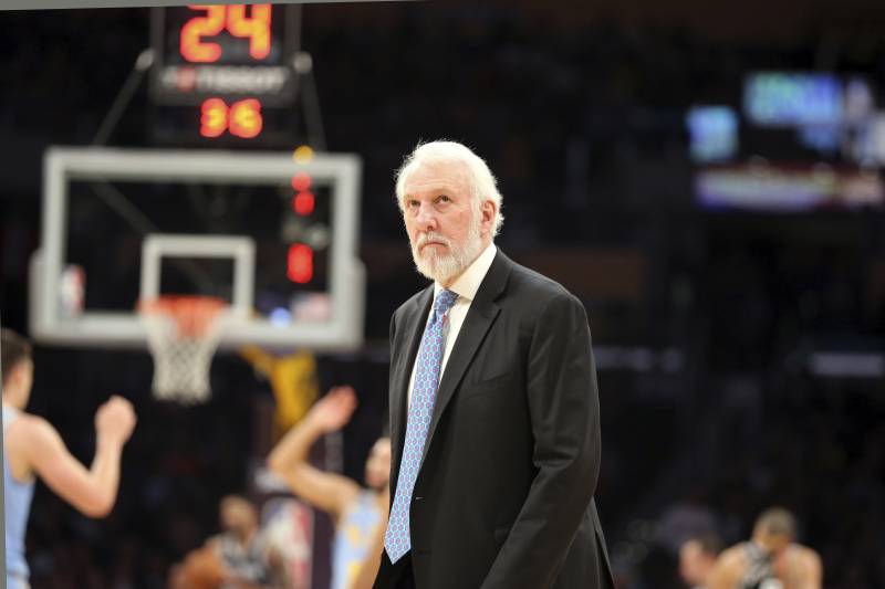 San Antonio Spurs head coach head coach Gregg Popovich during a timeout against the Los Angeles Lakers during the fourth quarter of an NBA basketball game in Los Angeles Wednesday, April 4, 2018. The Lakers won in overtime 122-112. (AP Photo/Reed Saxon)