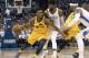 OKLAHOMA CITY, OK - APRIL 18: Donovan Mitchell #45 of the Utah Jazz battles his way around Paul George #13 of the Oklahoma City Thunder during the first half of Game 2 of the Western Conference playoffs at the Chesapeake Energy Arena on April 18, 2018 in Oklahoma City, Oklahoma. NOTE TO USER: User expressly acknowledges and agrees that, by downloading and or using this photograph, User is consenting to the terms and conditions of the Getty Images License Agreement. (Photo by J Pat Carter/Getty Images)