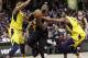Cleveland Cavaliers' LeBron James, center, drives between Indiana Pacers' Myles Turner, left, and Thaddeus Young during the first half of Game 2 of an NBA basketball first-round playoff series Wednesday, April 18, 2018, in Cleveland. (AP Photo/Tony Dejak)