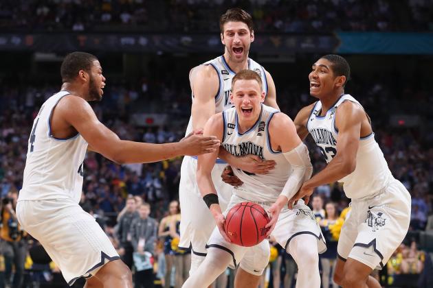 SAN ANTONIO, TX - APRIL 02:  Donte DiVincenzo #10 of the Villanova Wildcats celebrates with teammates after defeating the Michigan Wolverines during the 2018 NCAA Men's Final Four National Championship game at the Alamodome on April 2, 2018 in San Antonio, Texas. Villanova defeated Michigan 79-62.  (Photo by Tom Pennington/Getty Images)