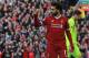 Liverpool's Egyptian midfielder Mohamed Salah celebrates after scoring their second goal during the English Premier League football match between Liverpool and Bournemouth at Anfield in Liverpool, north west England on April 14, 2018. / AFP PHOTO / Lindsey PARNABY / RESTRICTED TO EDITORIAL USE. No use with unauthorized audio, video, data, fixture lists, club/league logos or 'live' services. Online in-match use limited to 75 images, no video emulation. No use in betting, games or single club/league/player publications. / (Photo credit should read LINDSEY PARNABY/AFP/Getty Images)